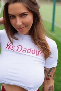 ample handsome girl seductively posing in lingerie