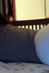 round woman teasing with lacy lingerie