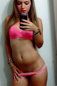 plump plumper chick posing seductively and provocatively with a coy glance